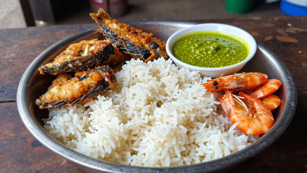 Traditional Panta Bhat meal with fried fish and mustard chutney