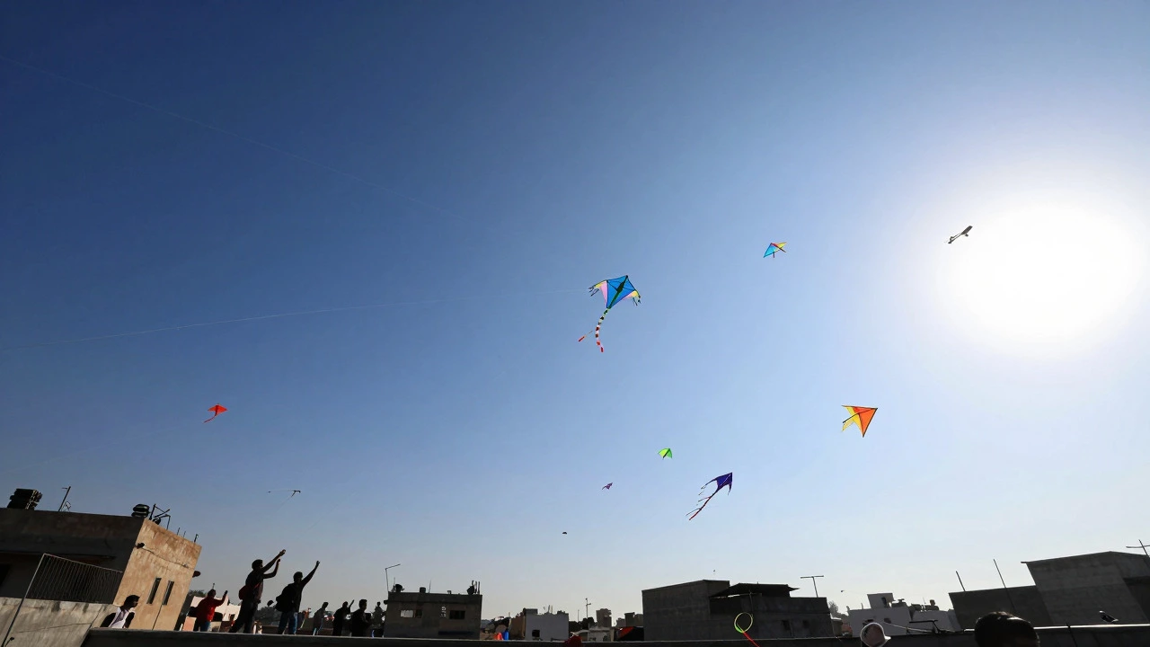 Colorful kites filling the blue sky above rooftops during Uttarayan festival